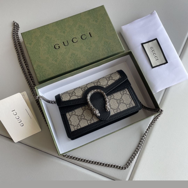G*u*i satchel bags